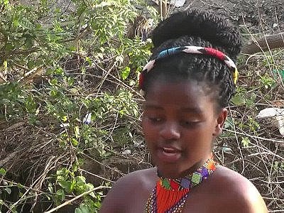 Topless African girls talking about... Something