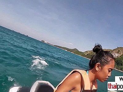 Amateur Thai teen Cherry sucking a big white cock on a jet ski outdoor